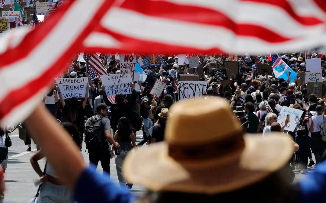 IN THE NEWS: Dueling Demonstrations Unfurled on Flag Day