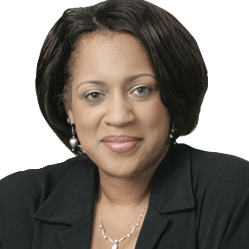 Professional portrait of a woman with short dark hair and earrings, wearing a black blazer. The image conveys confidence and approachability.