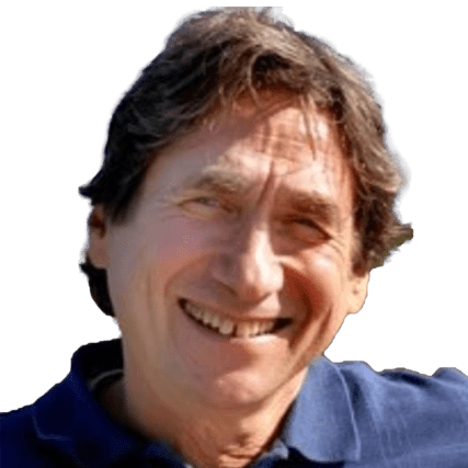 Smiling man with wavy hair wearing a blue shirt. The image conveys a sense of warmth and approachability, suitable for personal or professional contexts.